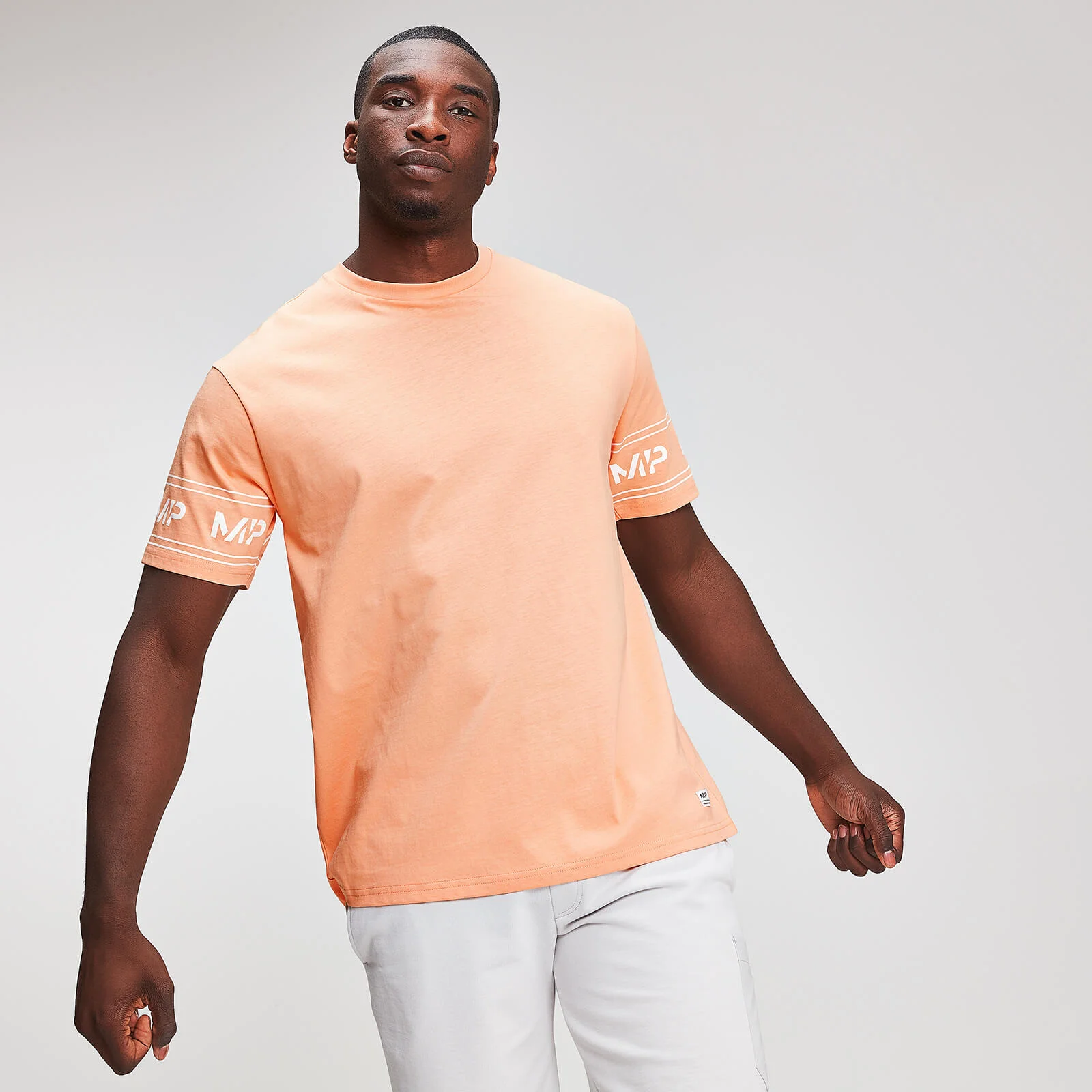 Myprotein Graphic Heren Sleeve Logo T-Shirt - Cantaloupe - XS Afbeelding 1
